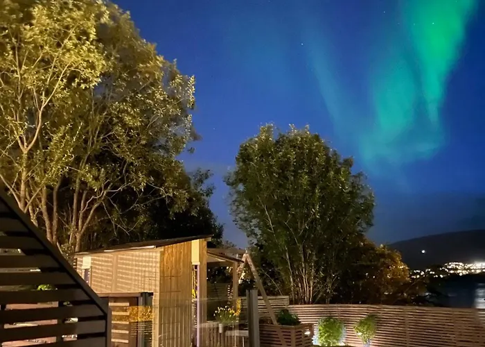 A Place For Aurora In Wintertime And Midnight Sun In Summer-time! *